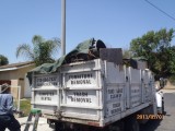 Bell junk removal trash truck